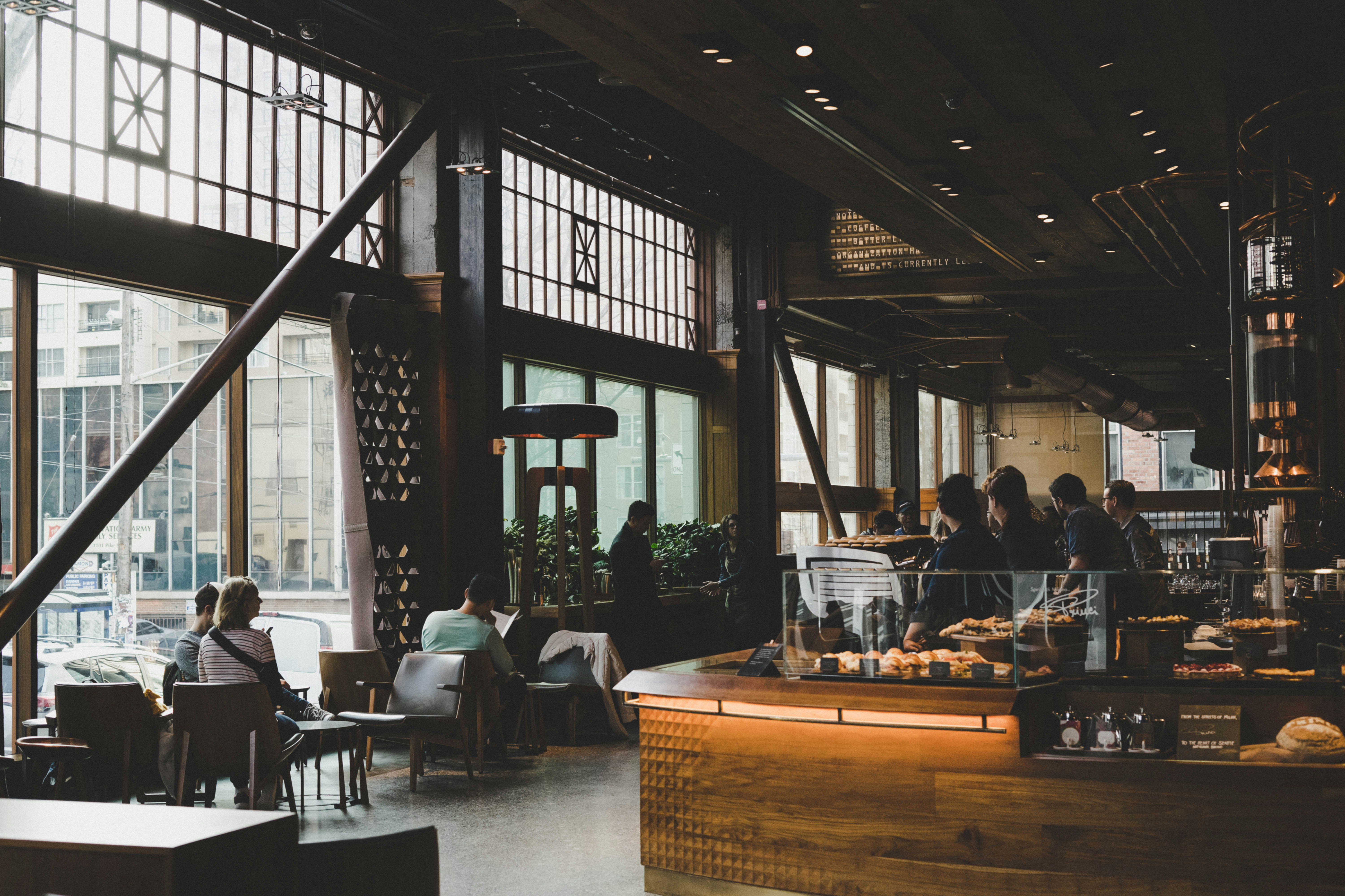 Inside Linger — tall windows, warm wood and a quiet morning crowd